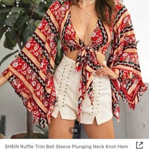 Ruffle trim bell sleeve plunging neck knot hem floral top